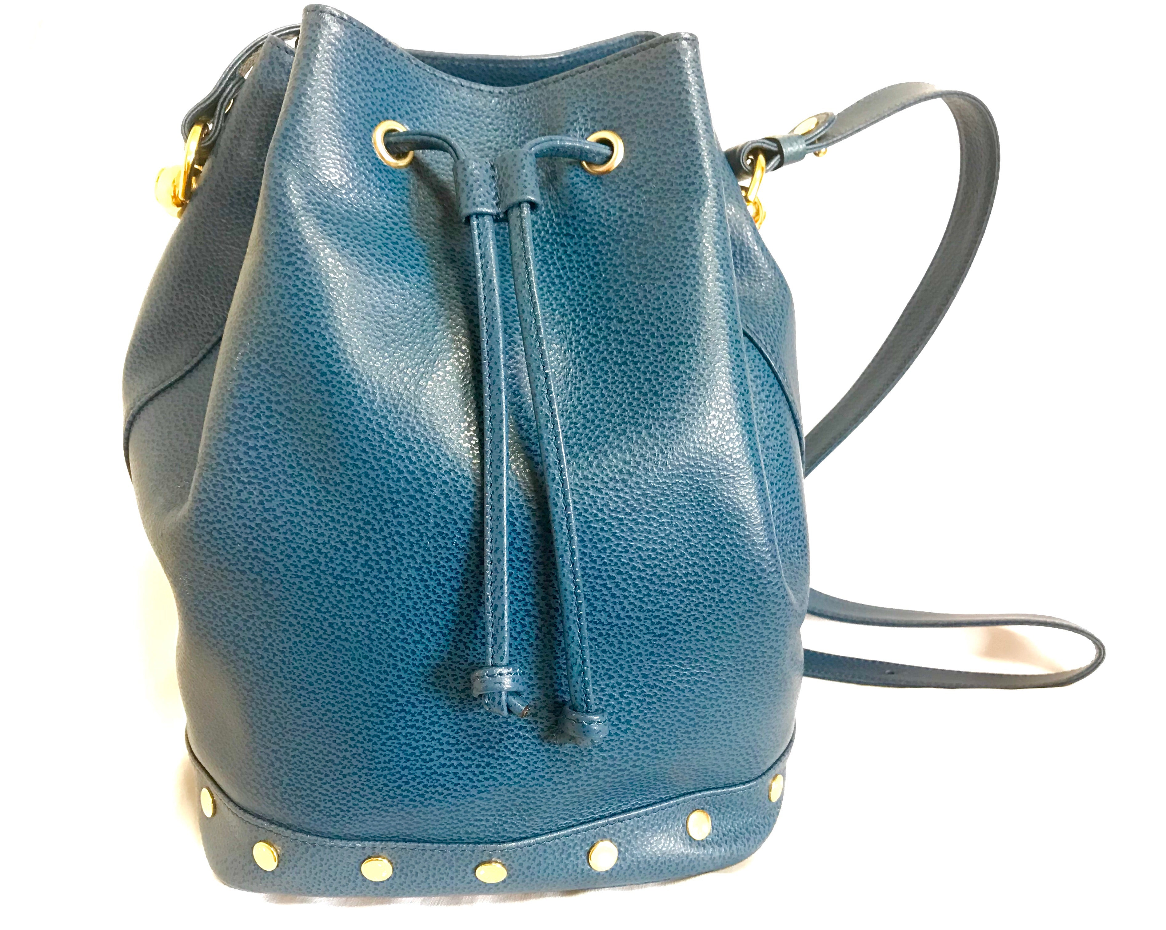 Vintage LANVIN blue grained leather hobo bucket shoulder bag with golden logo motifs. 070502re1