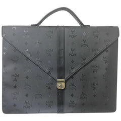 Vintage MCM black monogram briefcase, business bag, document purse with leather handle. Great masterpiece by Michael Cromer. 050320r19