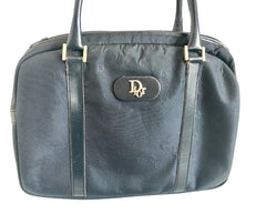 Vintage Christian Dior navy handbag with logo jacquard nylon and leather trimmings. Classic purse.