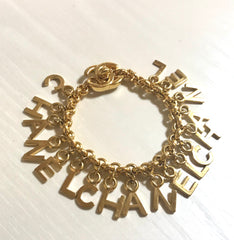 Vintage Chanel Turnlock CC closure and CHANEL letter dangle bracelet. Must have 90s jewelry. CC and logo letter charm bracelet. 060801re