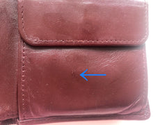 Vintage Cartier, must de Cartier wine leather square wallet with gold tone frames. Unisex use.