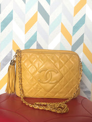 Ves Vintage Chanel yellow lambskin camera bag style chain shoulder bag with fringe and CC stitch mark. Good daily purse. Good fortune color.