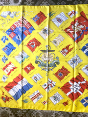 Vintage HERMES Carre large yellow silk scarf with red, blue, and white flag print. Best foulard. PAVOIS.