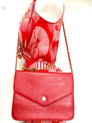 Vintage Valentino Garavani red leather chain shoulder bag with rose flower embossed design and round V motif. Can be clutch bag.