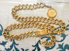 1980s-1990s. Vintage CHANEL golden thick chain belt with a golden CC charm and logo plate. 83cm at max