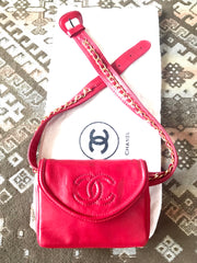 Vintage CHANEL red leather belt bag, fanny pack with detachable chain belt and CC stitch mark on flap. Fits 29.5" through 32.8"