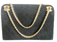 70's, 80's Vintage CHANEL genuine black suede leather kiss lock closure shoulder bag with gold tone CC marks and skinny chains. Rare purse.