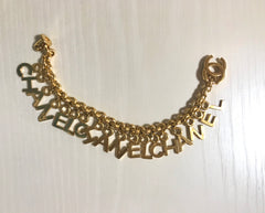 Vintage Chanel Turnlock CC closure and CHANEL letter dangle bracelet. Must have 90s jewelry. CC and logo letter charm bracelet. 060801re