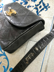 Vintage CHANEL black leather waist purse, fanny pack with golden chain belt and CC closure hock. 60-67cm, 23.5"-26.3" Goatskin.