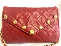 Vintage CHANEL red lamb leather shoulder bag with golden CC button motifs at flap. Rare purse. 070610re1