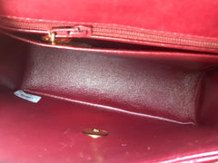 Vintage CHANEL deep red lambskin mini 2.55 bag with golden CC and chain strap. Classic Chanel red bag back in the era.