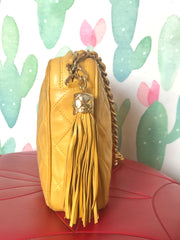 Ves Vintage Chanel yellow lambskin camera bag style chain shoulder bag with fringe and CC stitch mark. Good daily purse. Good fortune color.