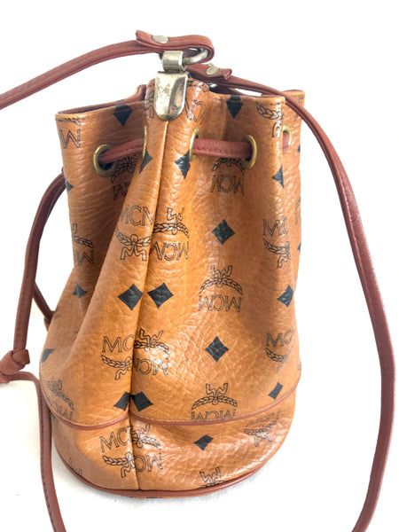 Vintage MCM brown monogram hobo bucket shoulder bag. Designed by