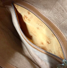 Vintage MCM suzy wong bag, brown grained leather round shoulder bag with studs and fringes. Designed by Michael Cromer. Nature. 060531r8