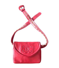Vintage CHANEL red leather belt bag, fanny pack with detachable chain belt and CC stitch mark on flap. Fits 29.5" through 32.8"