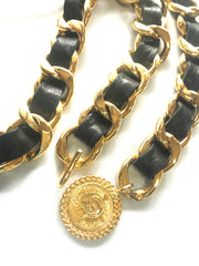 Vintage CHANEL black leather thick chain belt with golden mademoiselle and CC charm. Nice and heavy single layer belt.