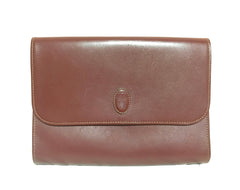 Vintage Cartier wine leather clutch bag, mini document purse with logo motif. Unisex bag from must de Cartier Collection.