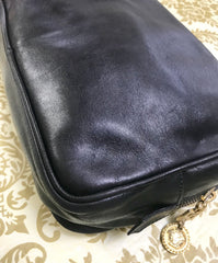 Vintage Gianni Versace black leather purse pouch, case bag with its iconic medusa face and golden logo motif charm. Unisex bag. 061122re1