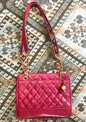 Vintage CHANEL cherry red caviar leather quilted shoulder bag, tote with golden CC ball and chain straps. Classic bag.