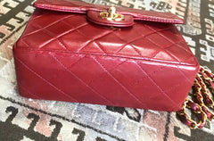 Vintage CHANEL deep red lambskin mini 2.55 bag with golden CC and chain strap. Classic Chanel red bag back in the era.