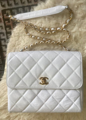 Vintage Chanel classic white caviar leather 2.55 square shape chain shoulder bag with golden CC closure. Must have purse.
