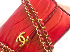 Vintage Chanel red 2.55 shoulder bag with wavy stitches and rope strings and gold chain strap. Very rare piece from the era. 050316r4