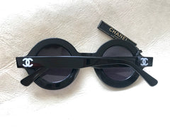 Vintage CHANEL black round frame mod sunglasses with white CHANEL PARIS logo. 060412