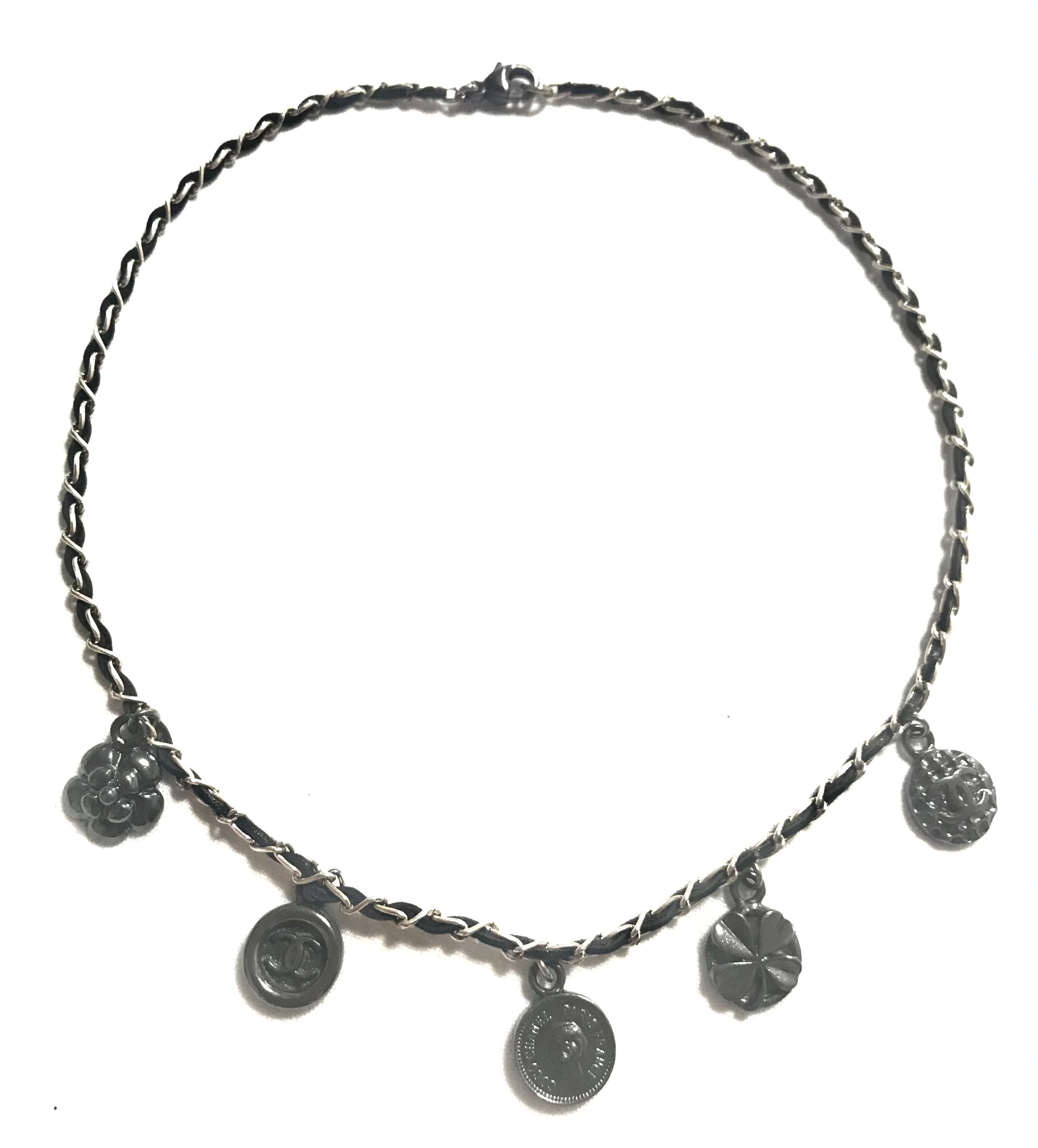 MINT. Vintage CHANEL skinny silver chain necklace with symbolic coin charms and black leather. Can be bracelet too. 060531r1