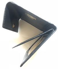 Vintage Gianni Versace black leather card case wallet with its iconic leopard, crown, and jewelry print. Unisex use.