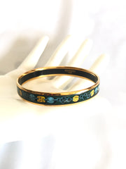 Ves. Vintage Hermes cloisonne enamel bangle with green, yellow, and blue. Charm and chain design. 050320r7