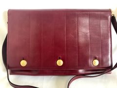 Vintage FENDI wine leather shoulder bag, large clutch purse with iconic Janus medallion embossed motifs at front. Unisex. 060620re5