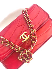 Vintage Chanel red 2.55 shoulder bag with wavy stitches and rope strings and gold chain strap. Very rare piece from the era. 050316r4