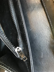 Vintage Gucci black leather shoulder bag with golden and silver tone GG logo motif. Classic purse. Can be clutch bag.