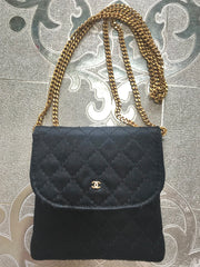 Vintage Chanel black quilted satin fabric mini pouch, coin purse, long necklace with golden chain and CC motif. Fiocci snap. 060516re2