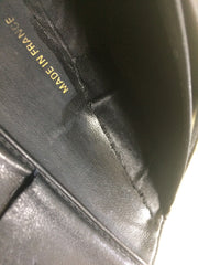 Vintage CHANEL black caviar leather wallet with large CC stitch mark logo. Classic wallet.