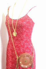 Vintage MCM brown leather round mini Suzy Wong shoulder bag with golden logo motifs. trimmings. Designed by Michael Cromer.