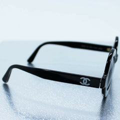 Vintage CHANEL black round frame mod sunglasses with white CHANEL PARIS logo. 060412