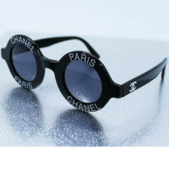 Vintage CHANEL black round frame mod sunglasses with white CHANEL PARIS logo. 060412