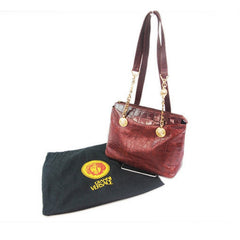 Vintage Gianni Versace brown croc-embossed leather shoulder tote bag with golden hardware and medusa charms.