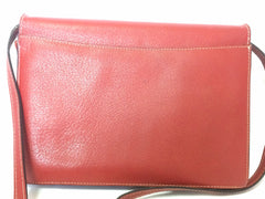 Vintage Valentino Garavani red pigskin shoulder clutch bag with unique logo stitch mark.