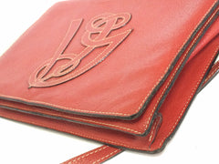 Vintage Valentino Garavani red pigskin shoulder clutch bag with unique logo stitch mark.