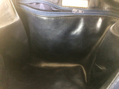 Vintage Valentino Garavani, Black nappa leather clutch purse, shoulder bag with tied bow, ribbon and V logo motif at front. 060616r4