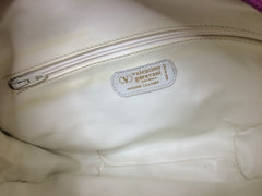 Vintage Valentino Garavani pink leather round shape shoulder purse with white small flower embroideries all over. So chic and cute.