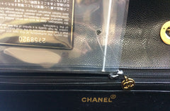 Vintage CHANEL black 2.55 jumbo caviar leather large shoulder bag with golden CC Vertical stitch. Classic caviar leather