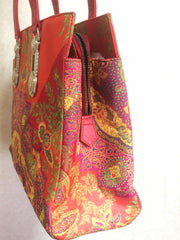 Vintage Gianni Versace gorgeous red orange and multi color ethnic and flower design shoulder, tote bag with silver medusa motifs. Lady Gaga