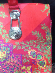 Vintage Gianni Versace gorgeous red orange and multi color ethnic and flower design shoulder, tote bag with silver medusa motifs. Lady Gaga