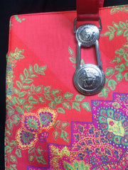 Vintage Gianni Versace gorgeous red orange and multi color ethnic and flower design shoulder, tote bag with silver medusa motifs. Lady Gaga