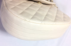 Reserved for Jessica. Vintage CHANEL ivory white lambskin 2.55 chain shoulder bag with large golden CC motif and oval flap.