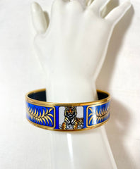 Vintage Hermes blue cloisonne enamel golden thick bangle, bracelet with tiger and leaves design in blue and gold. 070114ac3