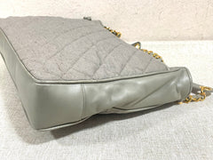 Vintage CHANEL taupe grey canvas and lambskin shoulder tote bag with gold tone chain straps and a CC ball charm. 070125ap1